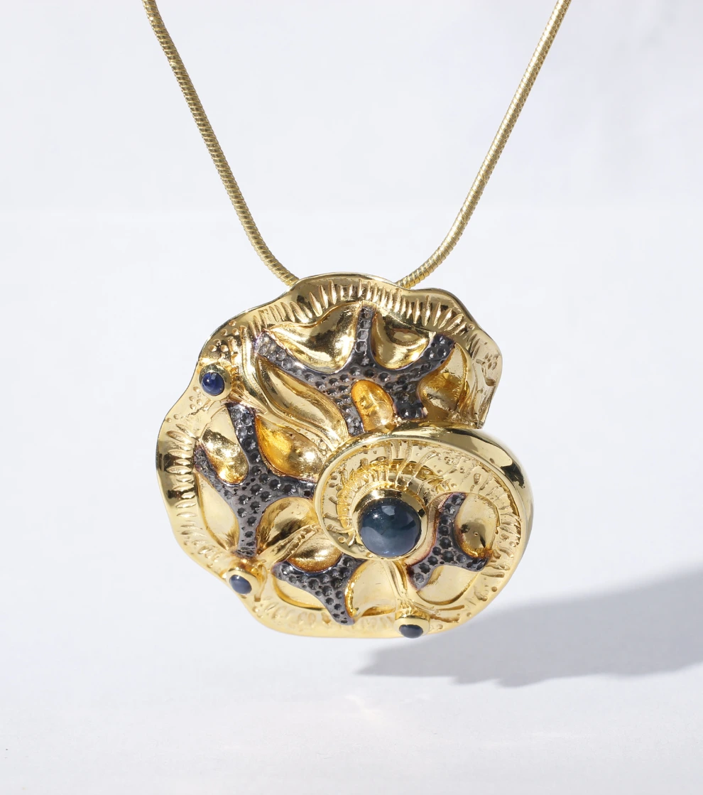 Abstract Nautilus Pendant in Black Star